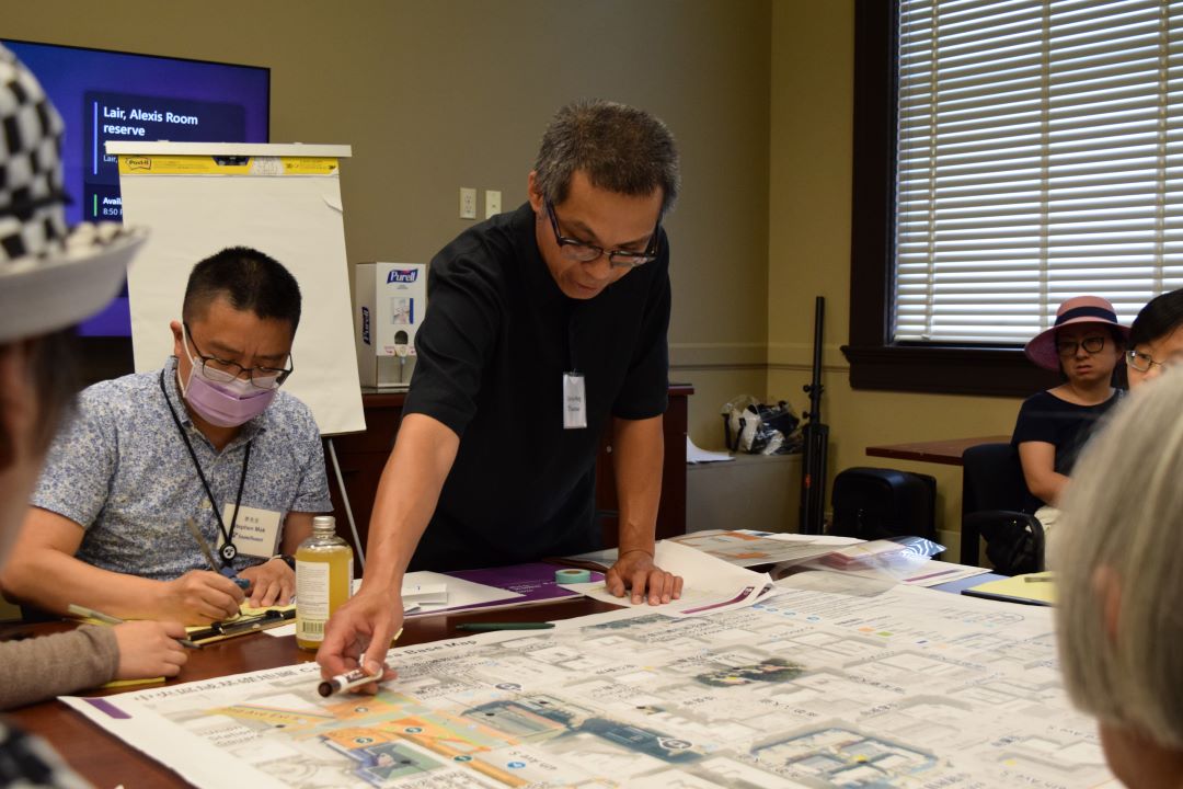 Facilitators guide workshop participants in Cantonese and English through an interactive and creative process of creating a new vision for public spaces in the Pioneer Square and CID neighborhoods.